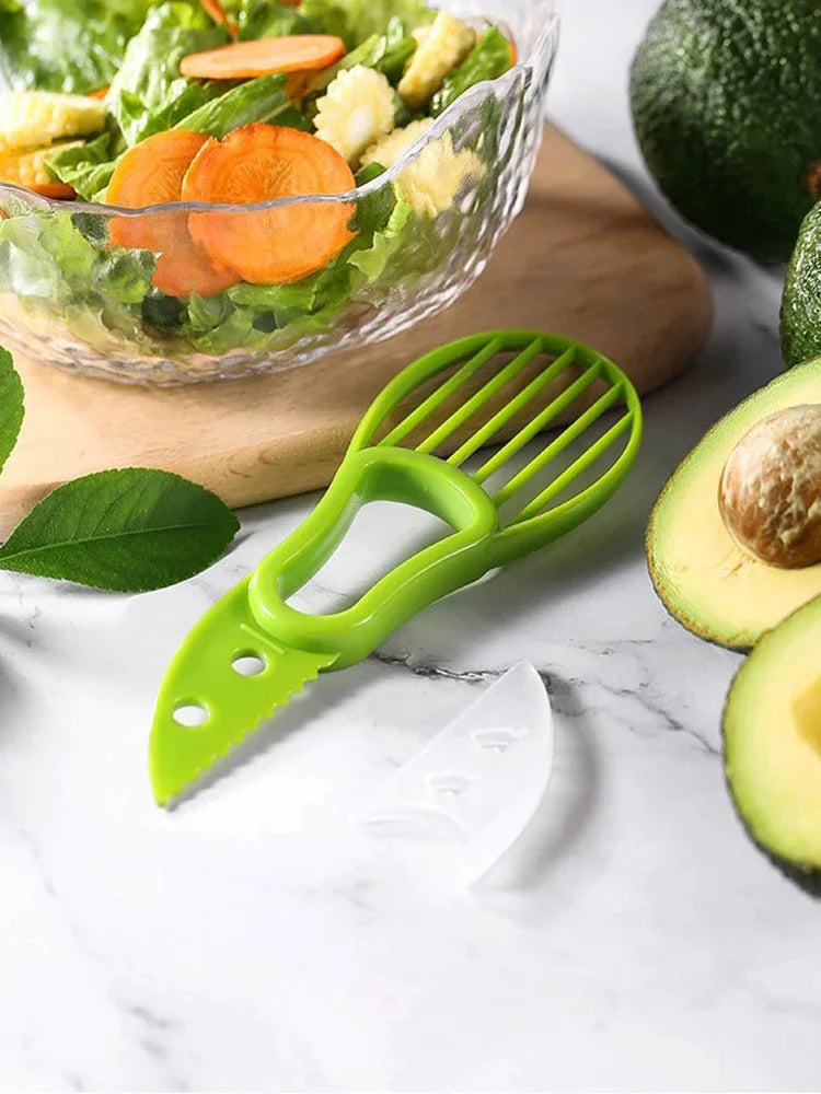 Showlu Smart General 3-in-1 avocado tool with peeling, pitting, and slicing functions shown in a close-up image.