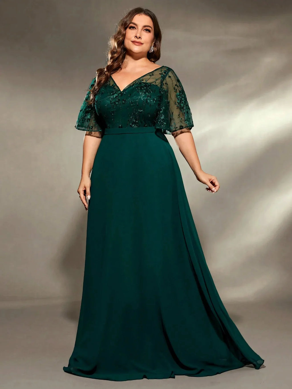 Plus size Mgiacy V-neck embroidered chiffon evening gown with ball gown silhouette, elegant and flowing for formal occasions.