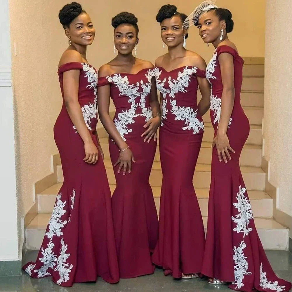 Burgundy off-the-shoulder mermaid satin bridesmaid dress by JC&STAR, featuring a fitted silhouette and elegant design.