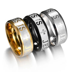 Three stainless steel rings with Jesus and cross engravings in gold, black, and silver tones.