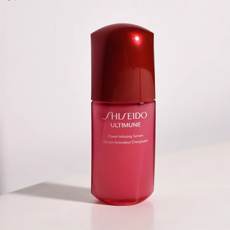 Shiseido Ultimune Power Infusing Concentrate IV face serum bottle with pump for skin strengthening, hydration, and repair.