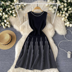 Showlu Fashion women's mini A-line sleeveless knitted dress with round neck, slim fit, perfect for streetwear and parties.
