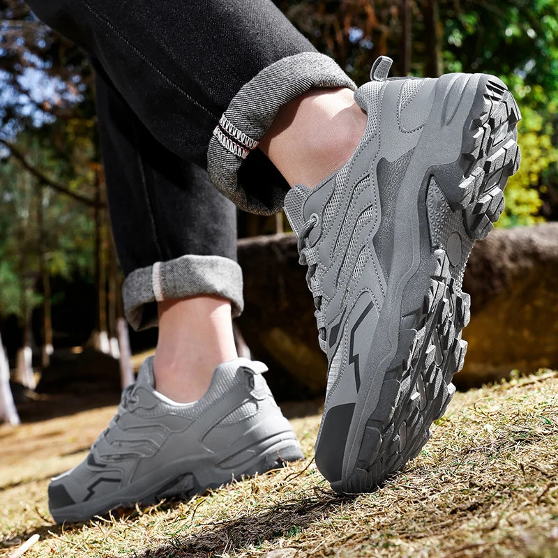 Unisex waterproof hiking shoes with non-slip soles, ideal for outdoor sports and camping, featuring a durable design and comfortable fit.
