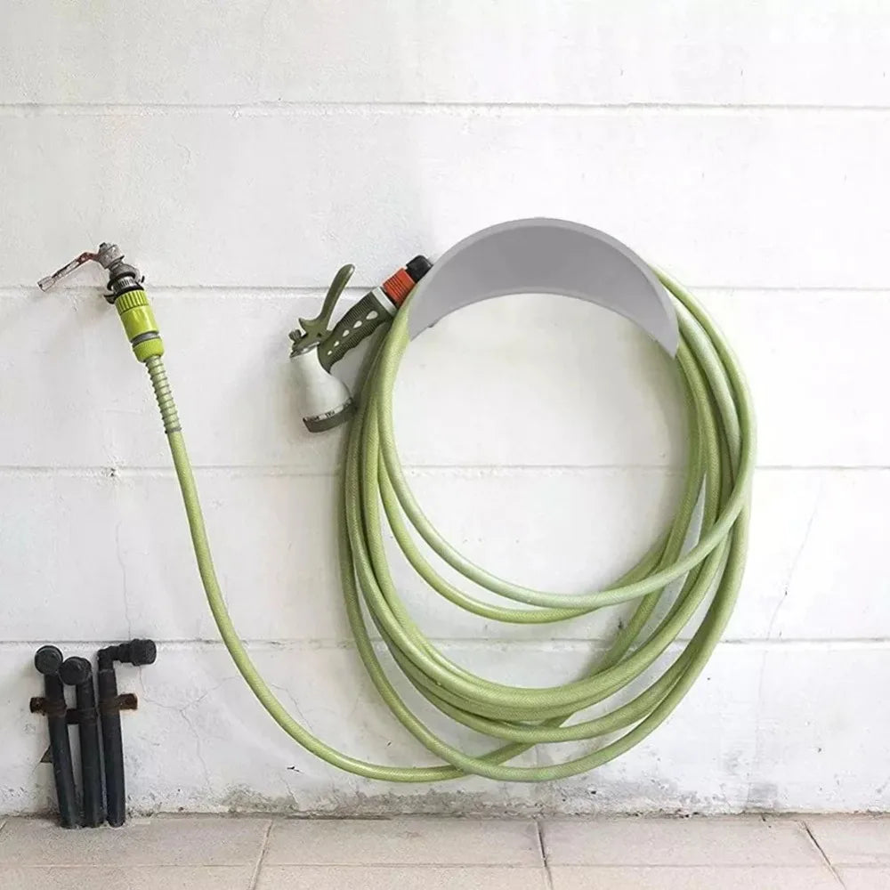 Wall mount hose holder by Showlu Fashion Store, sturdy metal design for organizing garden hoses efficiently.