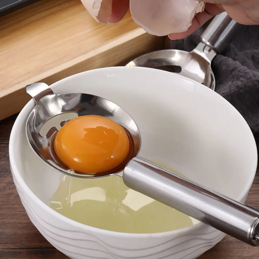 Long handle stainless steel egg separator with extended lug design, silver professional hangable yolk filter for efficient egg separation.