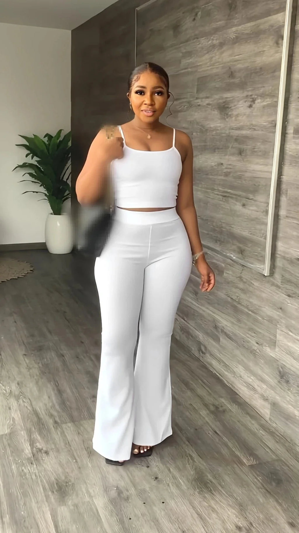 Stefion women's 2-piece summer set with sleeveless crop top and long pants, stylish and lightweight for warm weather.