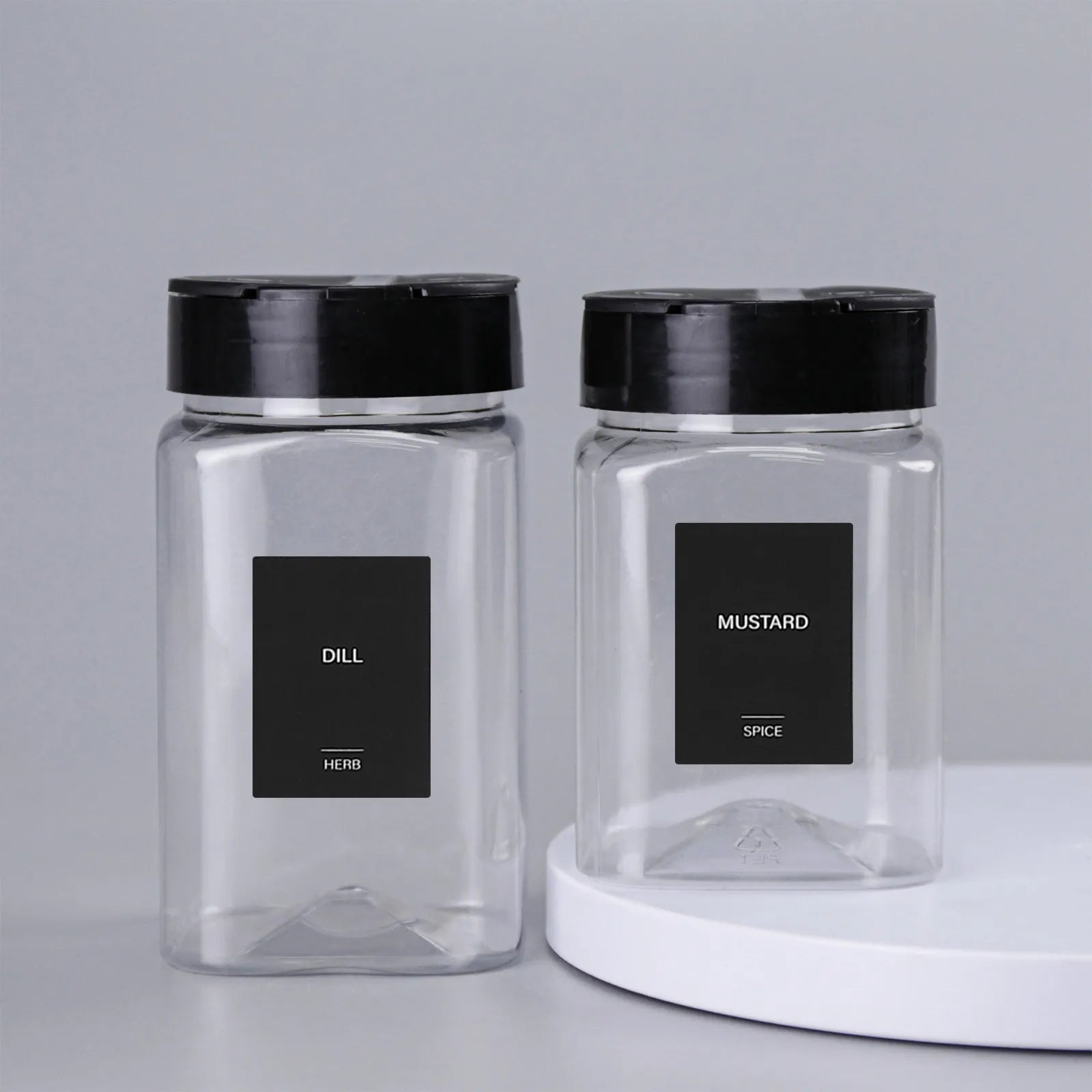 Set of 32 waterproof spice bottle labels, rectangle pantry stickers by Showlu for organizing spices and pantry items.