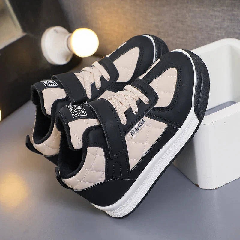 Showlu Fashion Kids winter sneakers in waterproof, anti-slip design with sturdy soles and colorful accents for outdoor walking.
