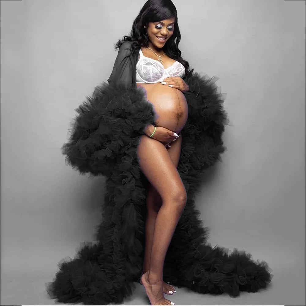 Sexy deep V-neck lace tulle maternity dress with long sleeves and feather details, ideal for photo shoots or special occasions.
