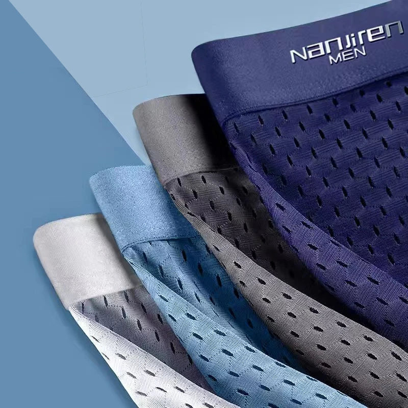 Showlu Men's Ice Silk Boxer Shorts with breathable mesh polyester fabric, comfortable men's underwear for everyday wear.