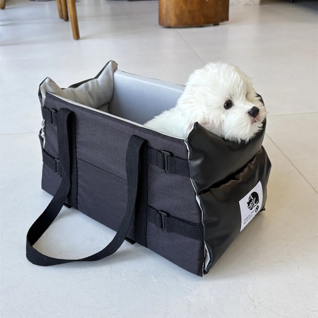 Showlu Fashion leather pet car seat for small dogs, portable travel bed with cozy interior and secure straps in the car.
