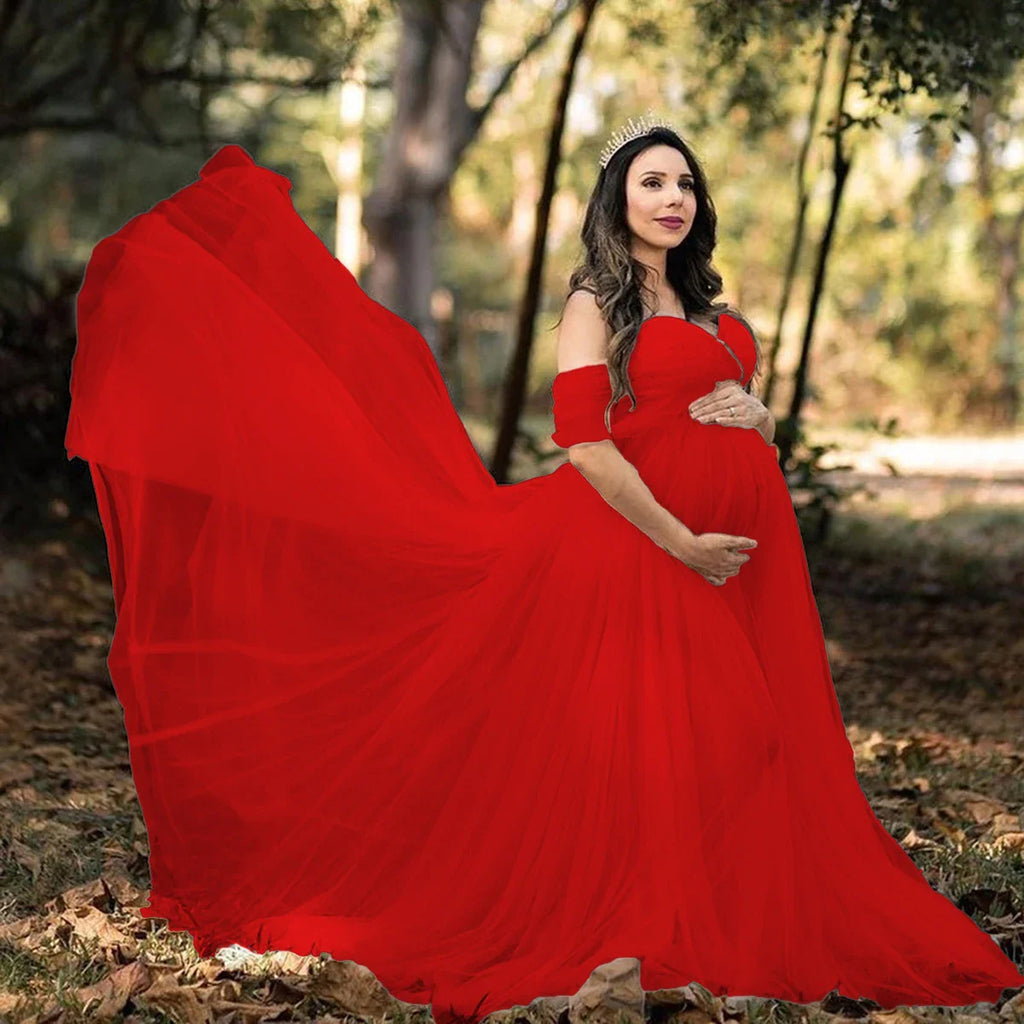 Off-shoulder Showlu Lace Mesh Maternity Gown, elegant pregnancy photo dress with delicate lace and flowing fabric.