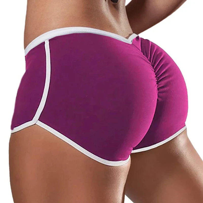 SHOWLU Women's yoga sports shorts in polyester spandex, designed for gym workouts and activewear, showing the fitted athletic style.