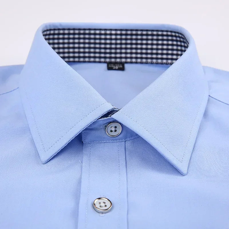 White men's dress shirt with French cuffs and long sleeves, featuring stylish cufflinks and a slim fit design.