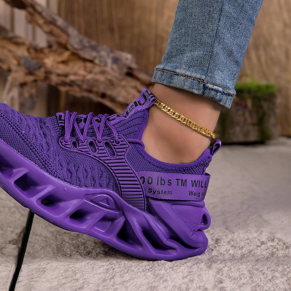 Purple women's sneakers with cushioned EVA soles, lightweight anti-slip design, ideal for running and casual wear.