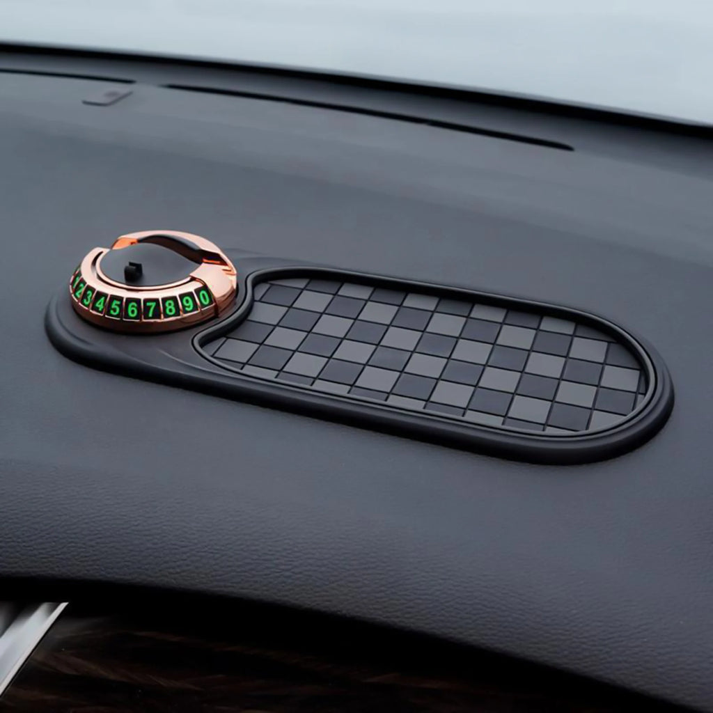Showlu Smart General car dashboard anti-slip mat showing textured surface with phone and small items securely placed