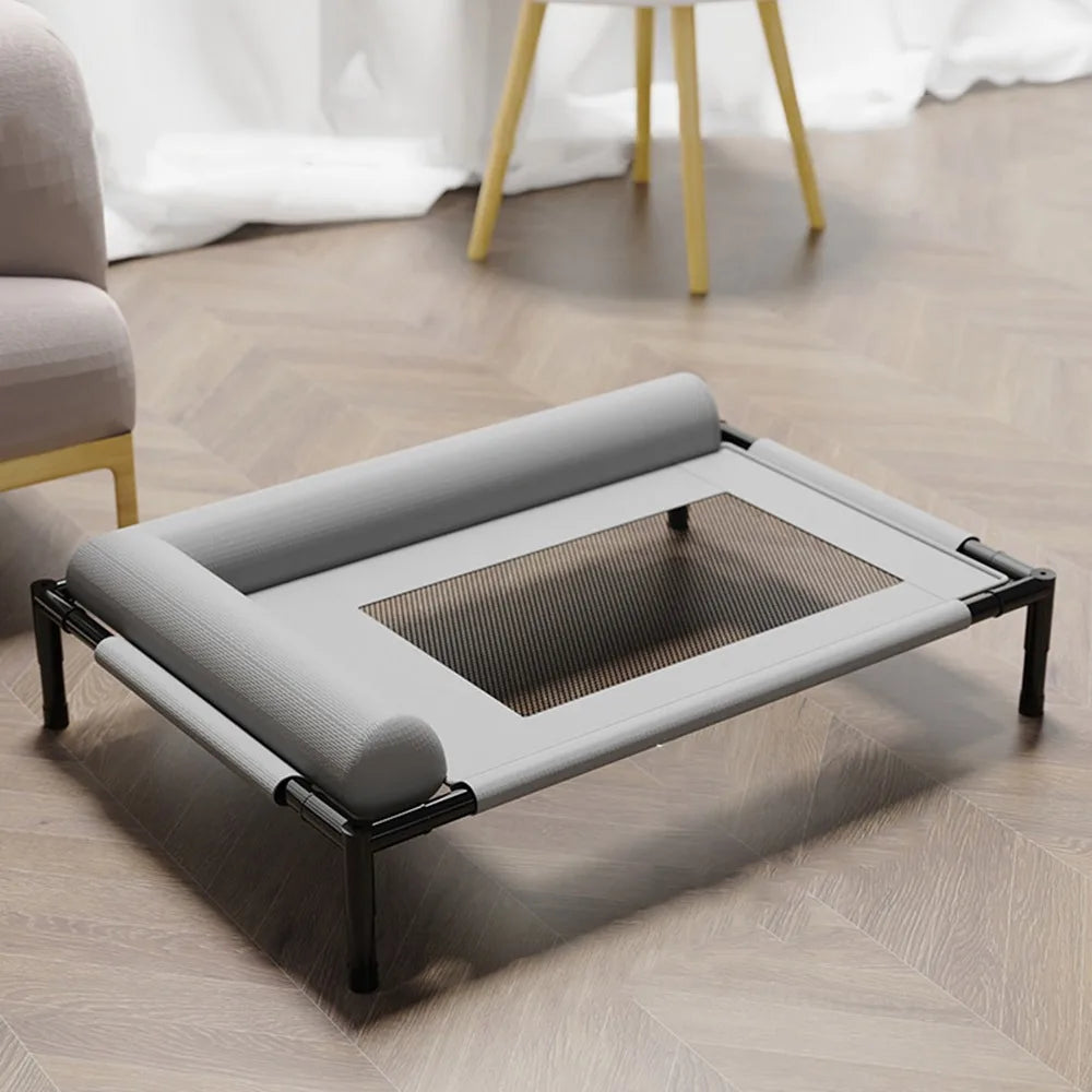 Showlu Mesh Elevated Dog Bed with breathable fabric, raised pet cot and pillow, providing comfort and support for dogs.