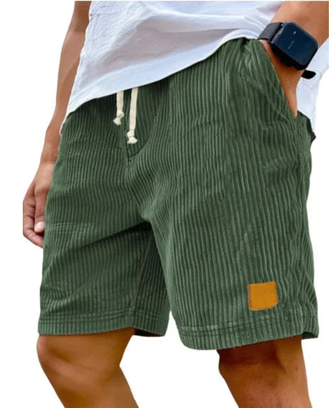 Men's retro corduroy casual shorts by Showlu Fashion, solid color, comfortable fit, suitable for relaxed, stylish streetwear looks.