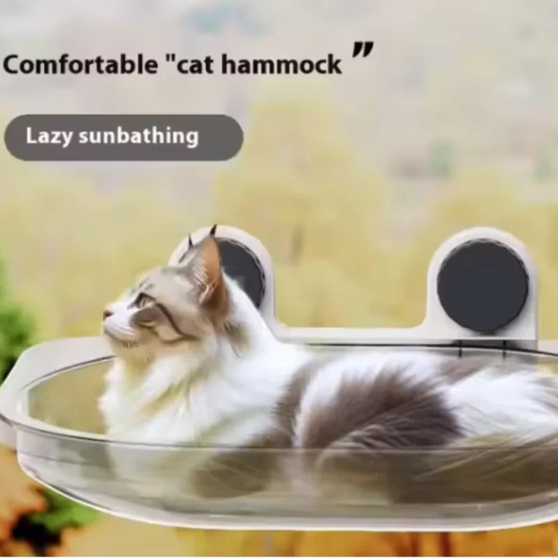 Showlu Smart General cat window hammock attached to a window, providing a cozy perch for cats to relax and enjoy the view.