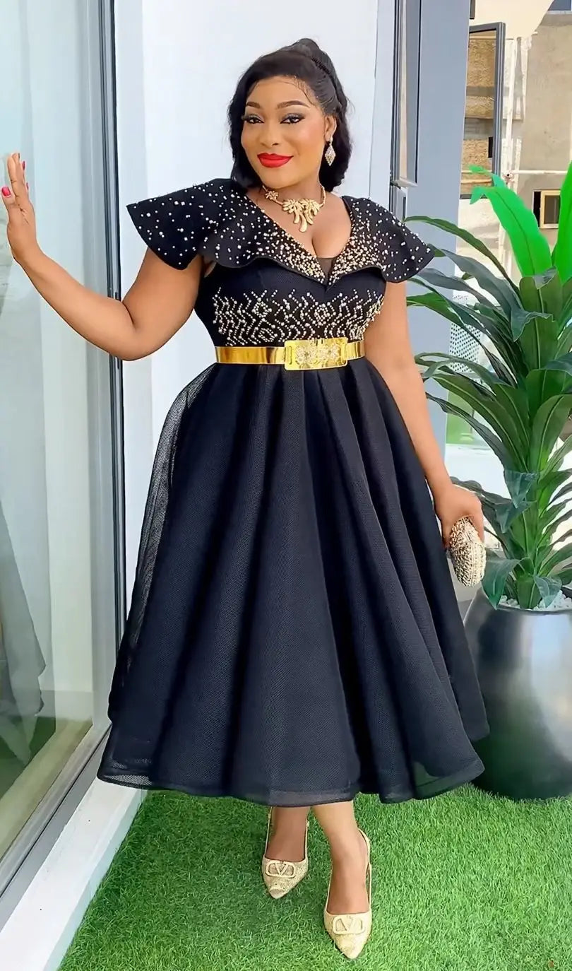 Dromiya women's rhinestone A-line evening gown with short sleeves and V-neck, shown in elegant black fabric.