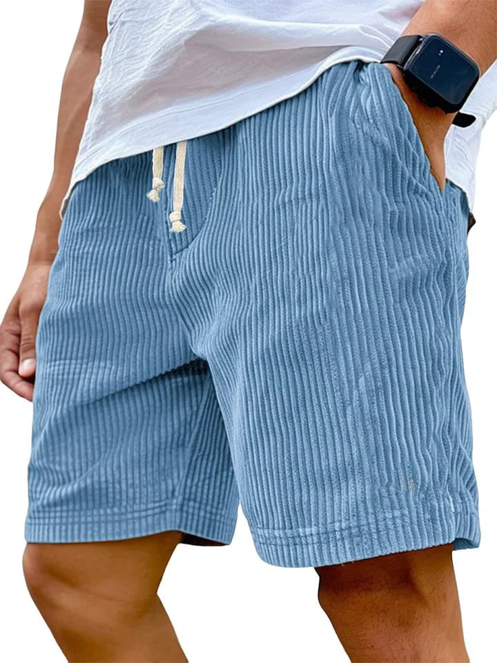 Men's retro corduroy casual shorts in solid color, stylish and comfortable, shown in a relaxed fit with pockets.