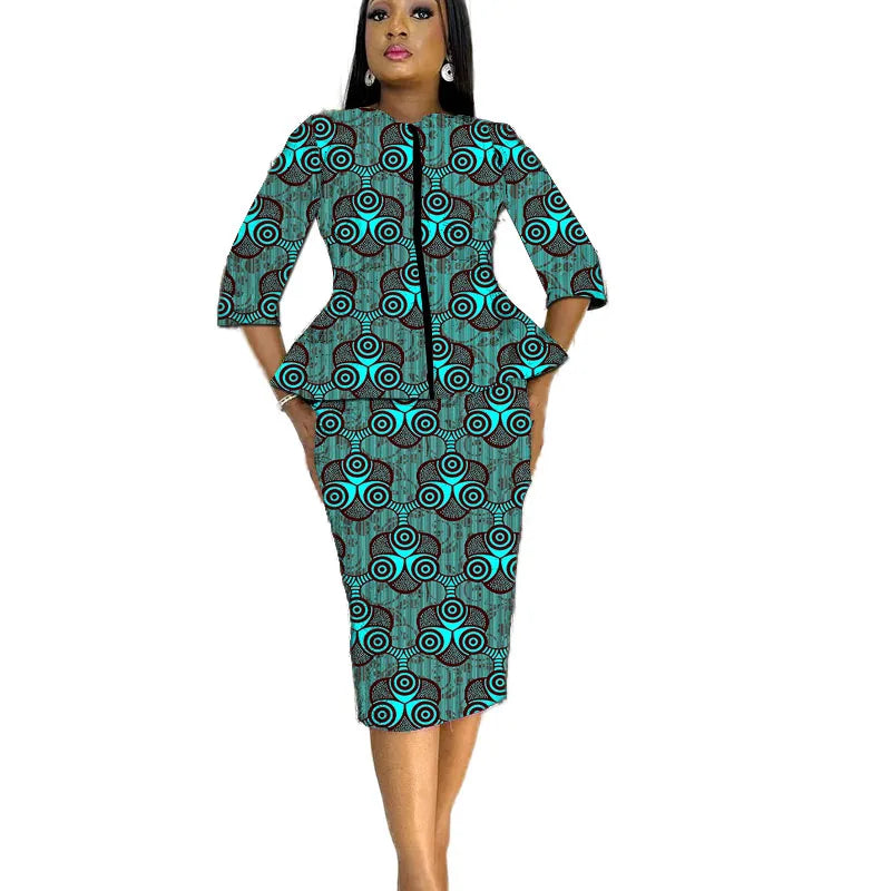 African print women's party outfit featuring a tailor-made blouse and skirt set with vibrant patterns and traditional design.