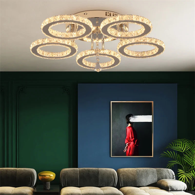 Modern crystal chandelier with chrome finish and LED flush mount design, featuring sparkling crystal accents and sleek contemporary style.