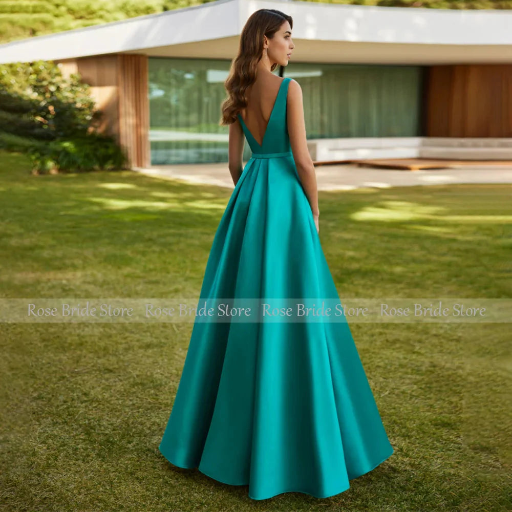 Turquoise satin A-line evening gown with V-neck, formal dress by SHOWLU FASHION STORE, elegant and flowing fabric.