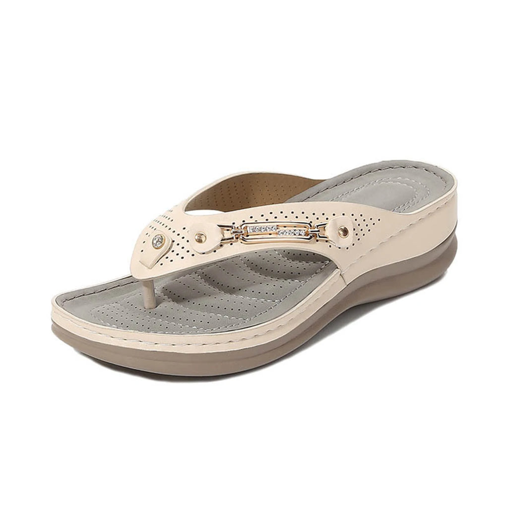 Women's soft cushion flip flops with thong design and orthotic support, ideal for casual wear, shown in neutral color.