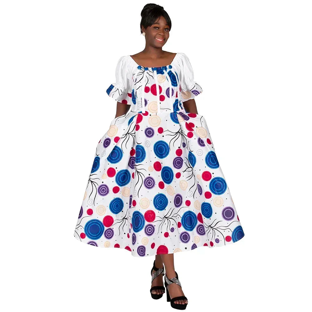 African print puff sleeve high waist Ankara cotton gown by SHOWLU FASHION STORE, featuring vibrant patterns and elegant design.