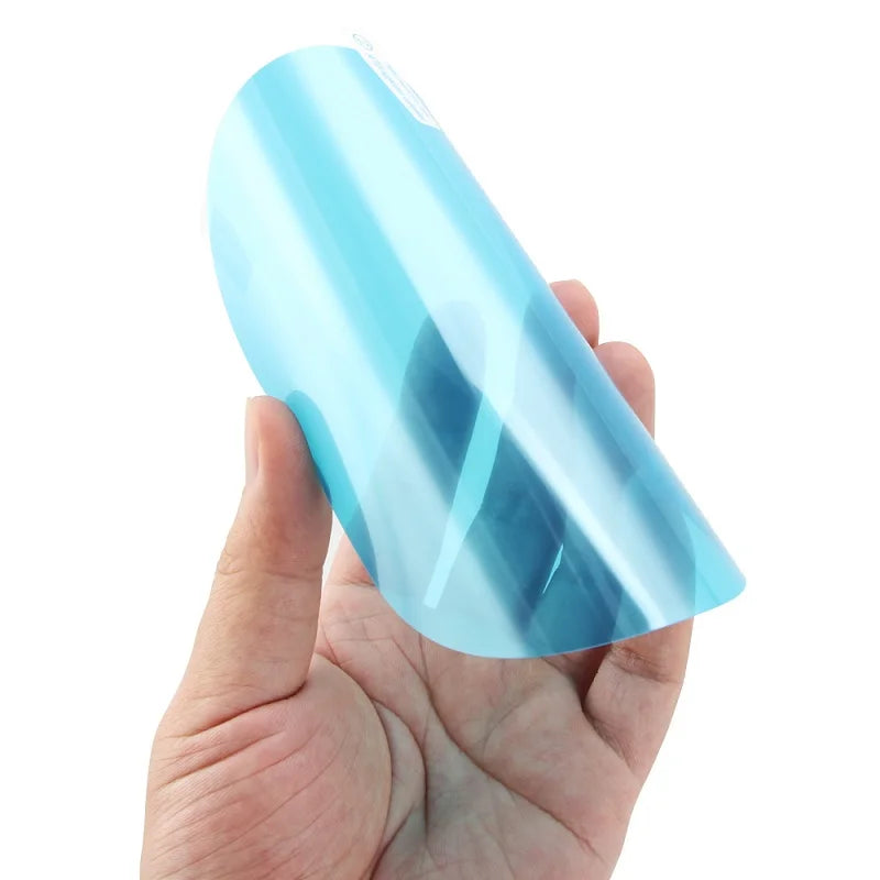 Showlu Smart General car rearview mirror anti-fog rainproof film set showing the film strips and packaging on a white background.