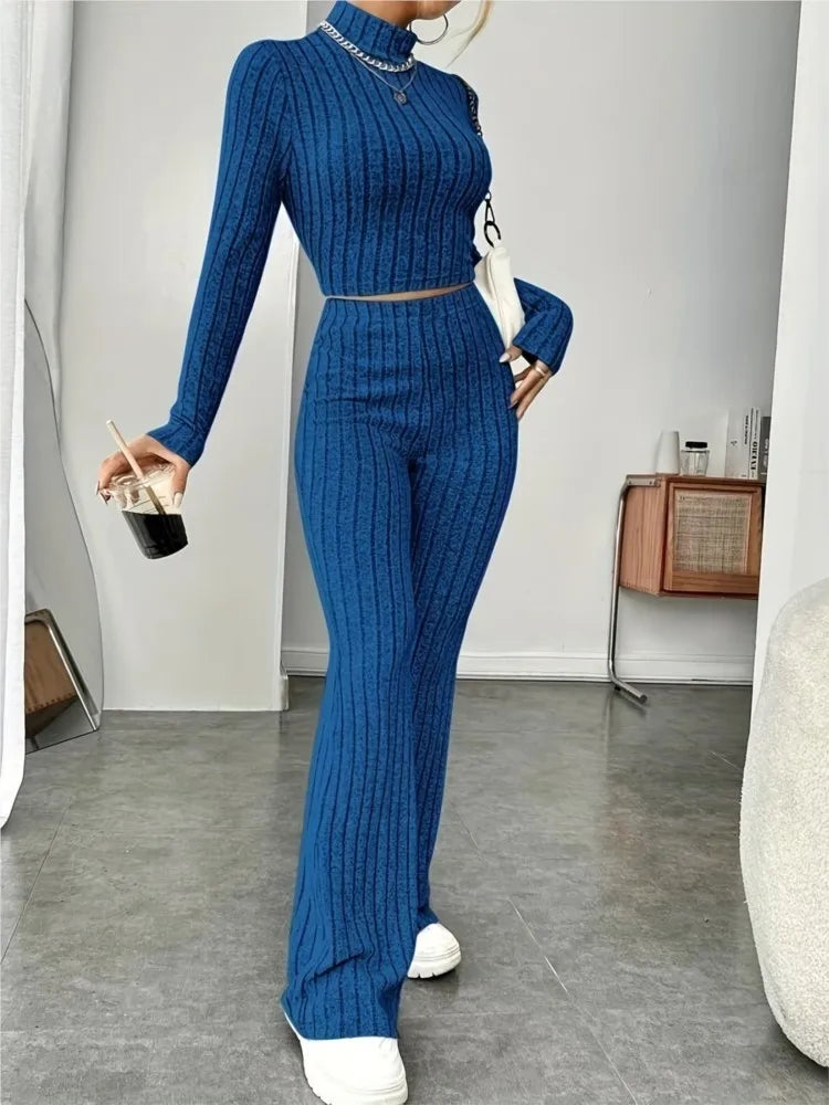 Autumn knitted two-piece women's bodycon tracksuit with long sleeves, crop top, and flare pants, stylish Y2K vintage outfit.