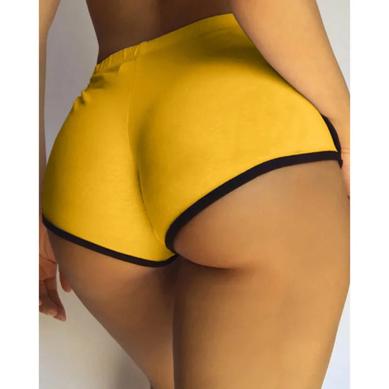 SHOWLU Women's Y2K high waist gym shorts in solid color, slim fit sportswear for active wear and casual workouts.