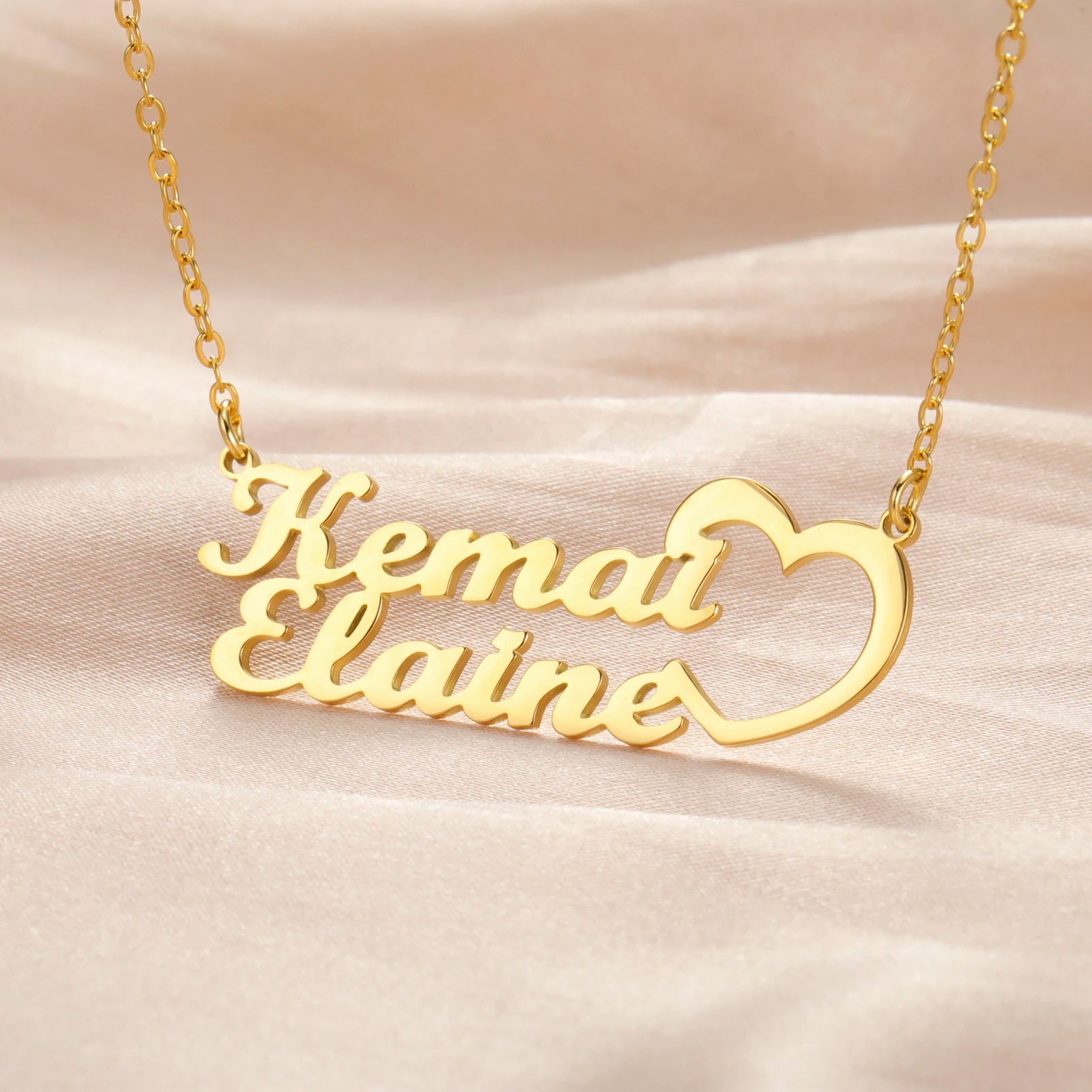 Double name plate necklace by Showlu Fashion, 3D stainless steel jewelry with customizable engraved names, displayed on a chain.