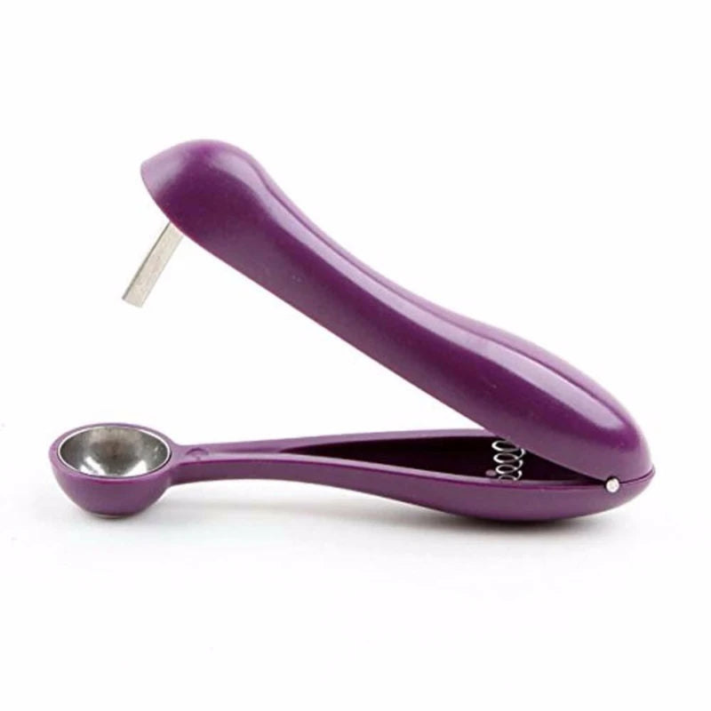 Cherry pit remover tool for kitchen, Showlu Fashion Store, designed to easily extract pits from cherries, olives, and other fruits.