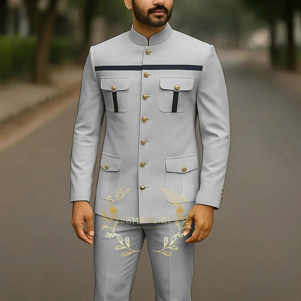 White single-breasted men's suit jacket and pants with stand collar, elegant groom wedding and party business attire.