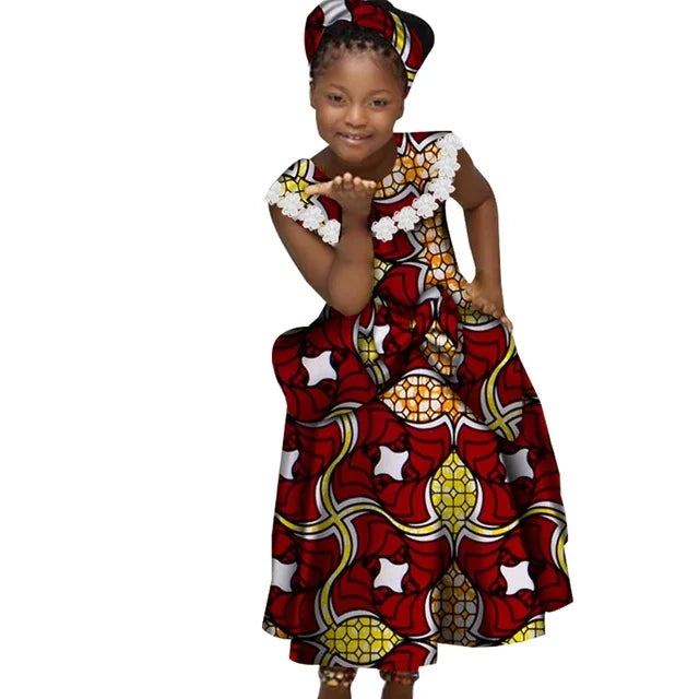 GuyaWax Girls African print mermaid dress in cotton Bazin Riche Dashiki with vibrant African patterns, styled for young girls.