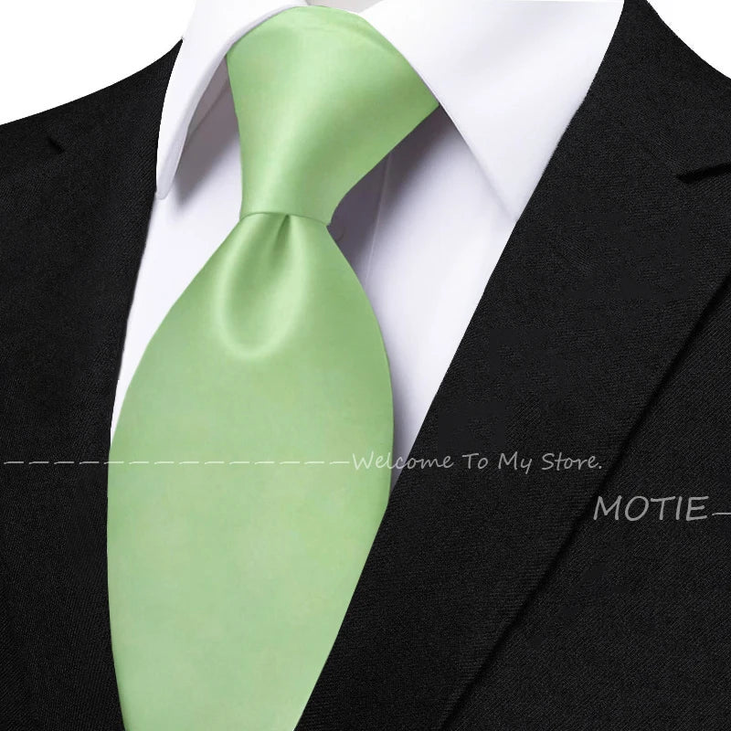 Men's solid color tie set with sage green pocket square, flower brooch, cufflinks, and collar accessory for wedding or daily wear.