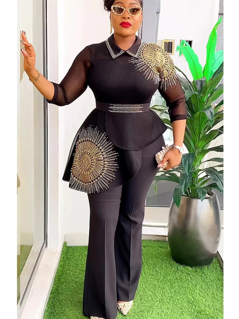 African Dashiki 2-piece set by SHOWLU FASHION STORE featuring polyester top and trousers with vibrant traditional patterns.