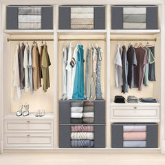 Several grey foldable storage boxes with clear windows are organized on the shelves of a closet.