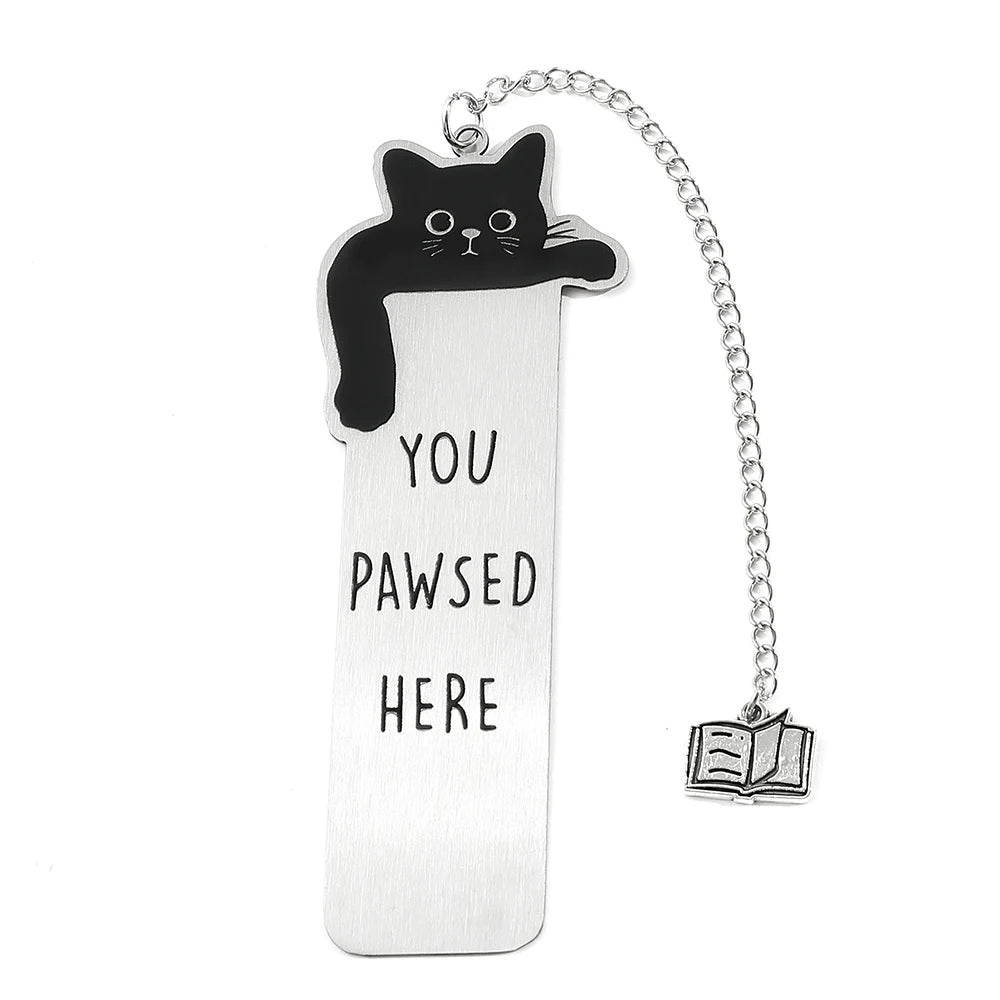 Colorful stainless steel waving cat bookmark with geometric design, ideal for marking pages in books.