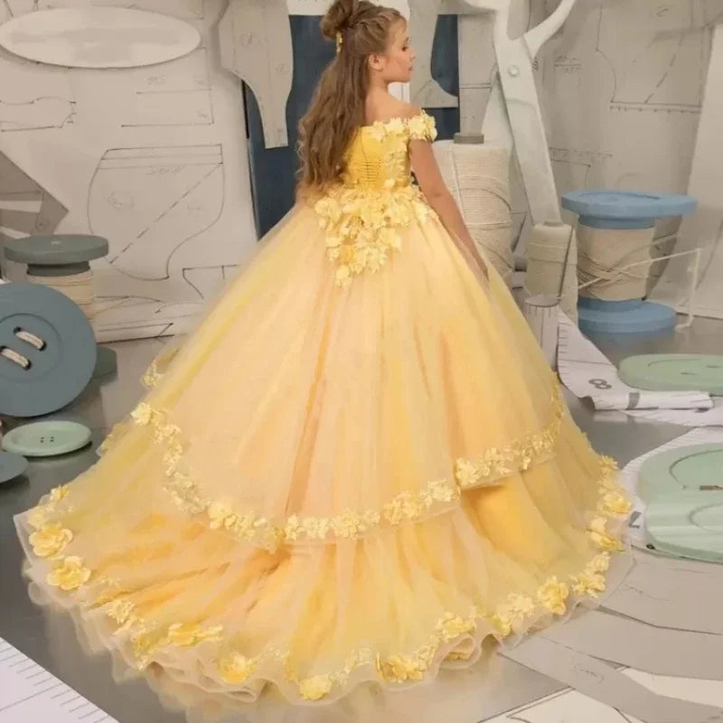 Yellow flower girl dress by Showlu Fashion with beading and appliqué for pageants, birthdays, and first communions for girls.