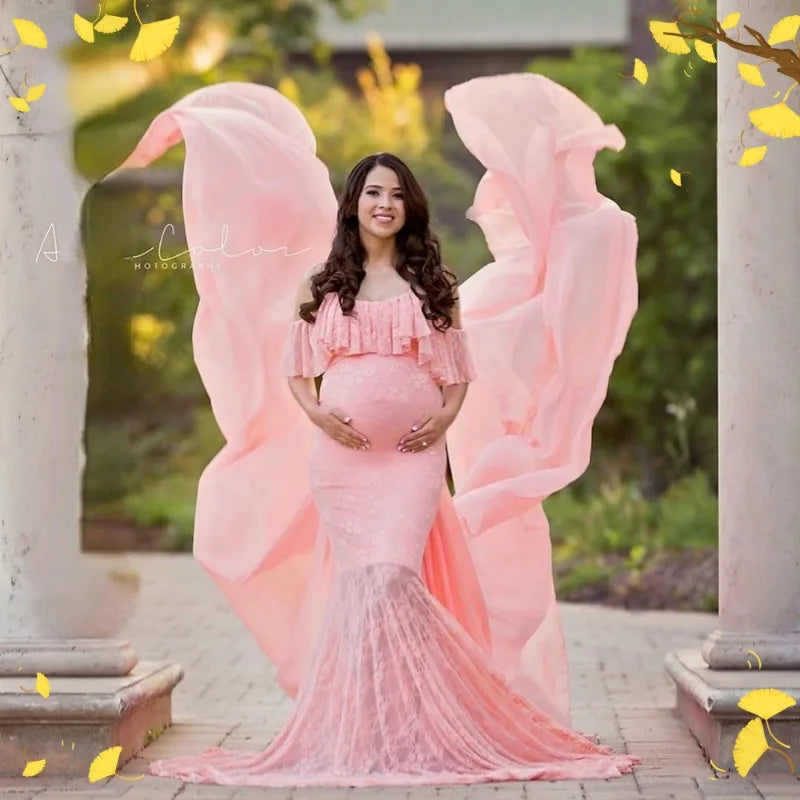 Pregnant woman in long sleeve lace Christmas dress for baby shower, perfect for maternity photos and festive photo shoots.