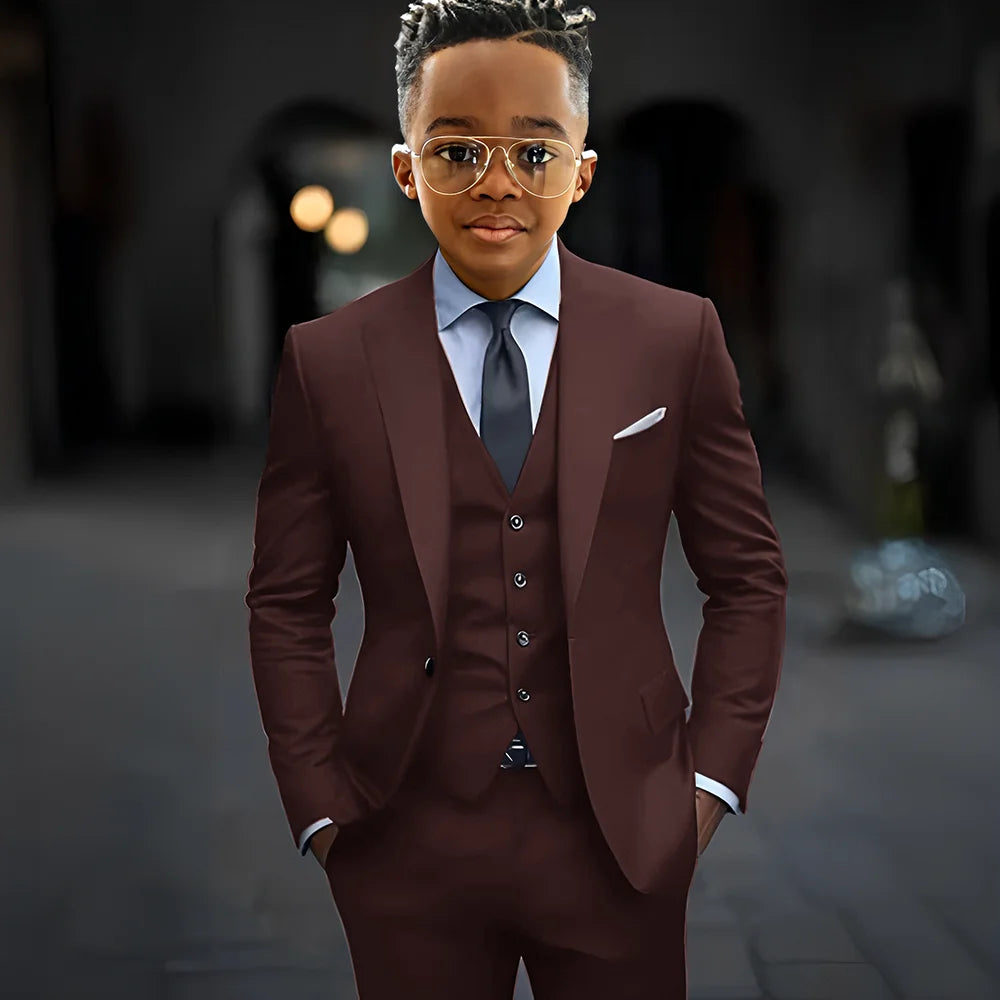 Dark grey high-quality boys' suit set with slim fit, single-breasted jacket, pants, and vest, featuring peak lapel for elegant kids' formal wear.