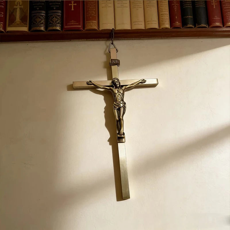 Metal wall crucifix cross with INRI inscription featuring Jesus Christ Catholic decor, displayed on a neutral background.