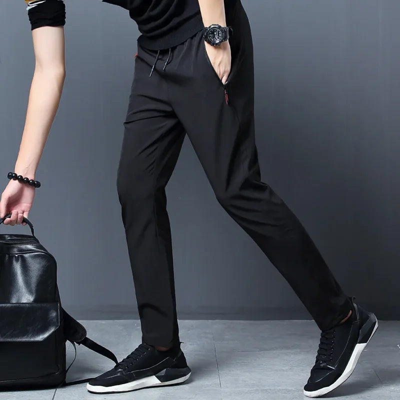 Lightweight SHOWLU Men's slim fit casual jogger pants in straight cut, made for comfortable everyday wear.