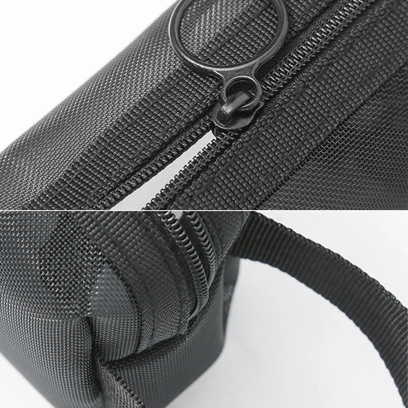 Large black travel cosmetic bag with mesh compartments for toiletries and makeup storage, ideal for organized travel use.