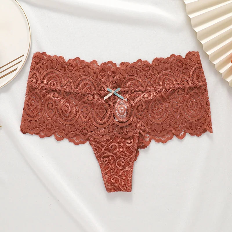 Sexy lace women's thong from Showlu Fashion, low-waist breathable G-string lingerie with delicate lace details.