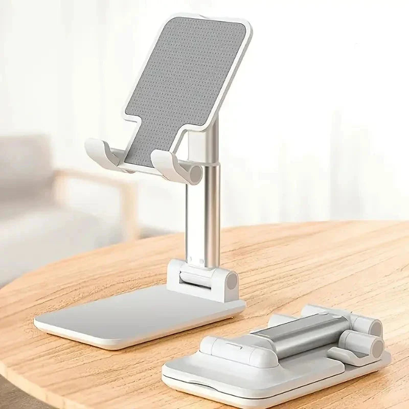 SHOWLU Universal adjustable desk phone stand holding an iPhone and tablet on a modern workspace.