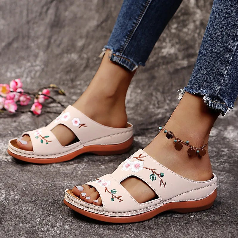 SHOWLU Women's embroidered flower leather wedge sandals with floral designs, perfect for summer wear and casual outings.